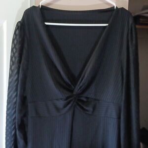 Blouse with patterns on sleeve